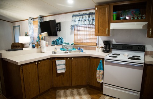 Eufaula House | Lake front retreat, covered boat dock, large deck, fenced play area, RV parking