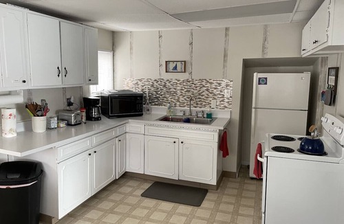 Mayville Cottage | LAKE Getaway w GREAT VIEWS + dock+ fire pit + BBQ