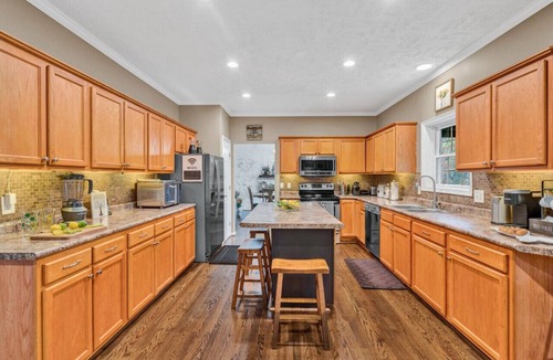 High Point House | Lake-It- Easy- Pet-friendly home with sunrise views. E enjoy the kayaks during the day and the firepit in the evening.