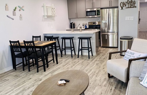 Walden on Lake Conroe Condo | Lake Life Condo with Brook, Lake, & Pool Views