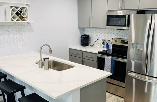 Walden on Lake Conroe Condo | Lake Life Condo with Brook, Lake, & Pool Views