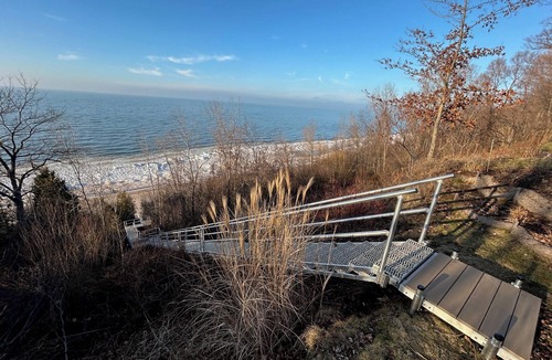 Riverside House | Lake Michigan retreat w/private beach access, family friendly, solar & gardens