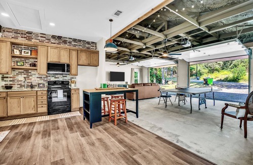 Flint House | Lake Palestine Modern Cottage Game Room, Firepit, Green Kitchen