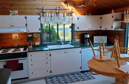 Lake Goodwin House | Lake Shoecraft Waterfront Log Home