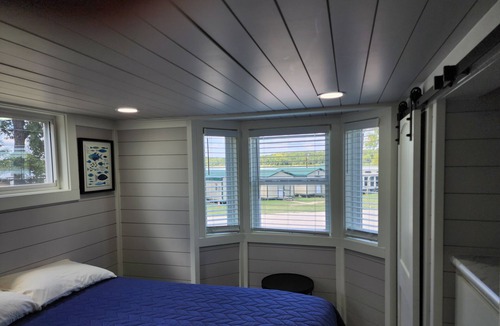 Berryville Cabin | Lake Side Tiny Home, large deck.
