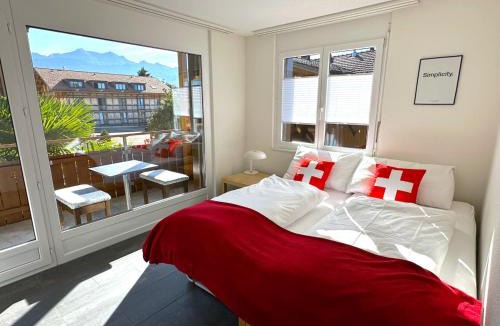 Merligen Apartment | Lake Thun Alps Scenic Views and Concierge by SwissHut