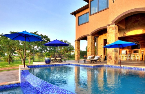 Highland Lake Estates Villa | Lake Travis Waterfront Home w/ views, Pool, Dock, Outdoor Kitchen, Open-Air Bar