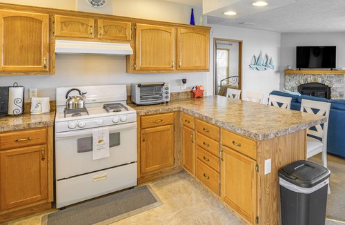 Harbor Beach House | Lake View Home w/Deck, Yard & Fire Pit!