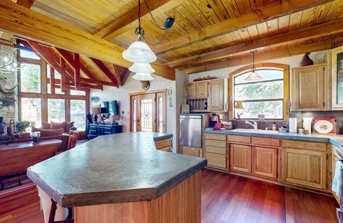 Whitney House | Lake view home with expansive yard, lovely porch & nearby lake access