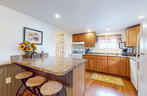 Cayuga House | Lake-view retreat with dock access, firepits, & large yard