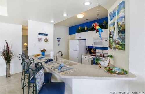 Lakeland Condo | Lake views for miles! 3 BR, 2 BA, 3rd floor condo in Harbour Towne, Lake Ozark.