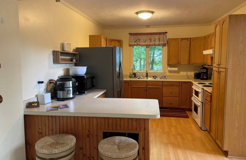 Laconia House | Lake Winnipesaukee area private hot tub