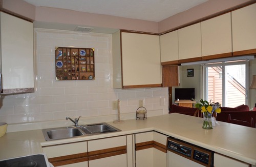 Melvin Village Condo | Lake Winnipesaukee beachfront property.