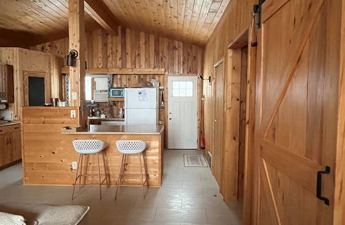 Traverse Bay Cottage | LAKEFORNT-NEW LISTING BY NIRVANA RENTAL AND PROPRTY MANAGEMENT