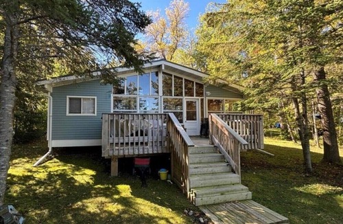 Traverse Bay Cottage | LAKEFORNT-NEW LISTING BY NIRVANA RENTAL AND PROPRTY MANAGEMENT