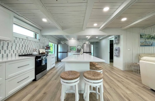 Sunrise Beach House | Lakefront 3-bedroom, 3.5 bath - enclosed porch, private dock, hot tub & fire pit