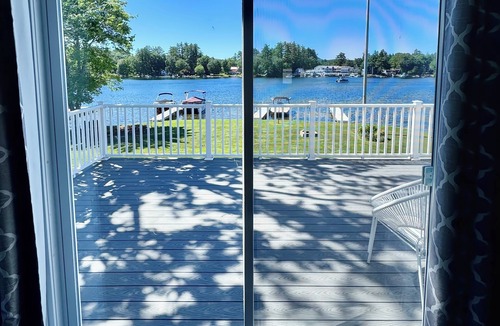 Lochmere House | Lakefront 3-bedroom Duplex on Lake Winnisquam, docks, Beach, WiFi, AC.nB1A