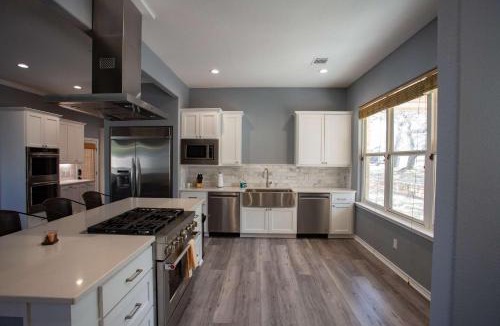 Burnet House | Lakefront 6BR Retreat w Dock & Game Room