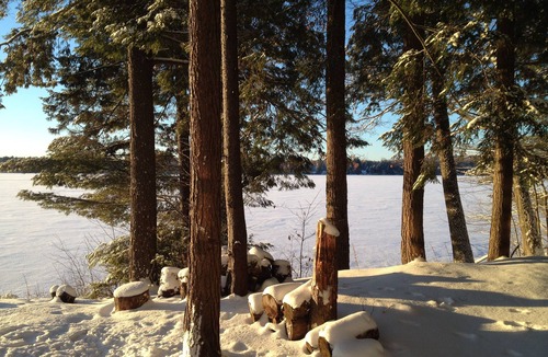 Caroga Lake Cabin | Lakefront accommodations with outdoor Jacuzzi