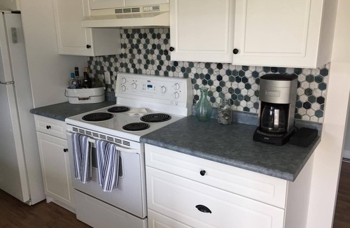 Dashwood Cottage | Lakefront Beach House w/Hot Tub, Private Sandy Beach & Stunning Sunsets
