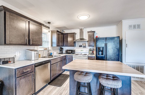 Hoyt Cabin | Lakefront, Boat Slip, Sandy Beach, 2 Living Rooms. Sleeps 12. Dates Available!
