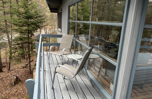 Three Lakes Cottage | Lakefront Cabin on Virgin Lake w/kayaks, lily pad, firepit, sandy swimming area