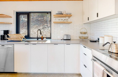 Rogers Cabin | Lakefront cabin with water access, washer/dryer, central AC & fireplace