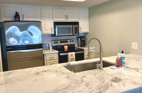 Lake Park Condo | Lakefront Condo w/Pool!