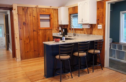 Teall Beach House | Lakefront Cottage w/Dock & Fire Pit - Pet-Friendly