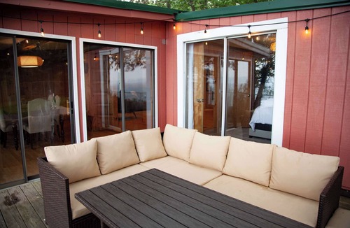 Teall Beach House | Lakefront Cottage w/Dock & Fire Pit - Pet-Friendly