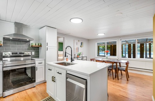 Fall City Cabin | Lakefront cottage with docks, kayak, deck, firepit & beachfront, drive to skiing