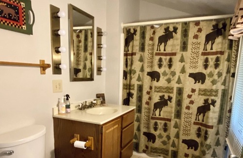 Belgrade House | Lakefront Cottage with Sandy Beach across from Belgrade Golf Course.