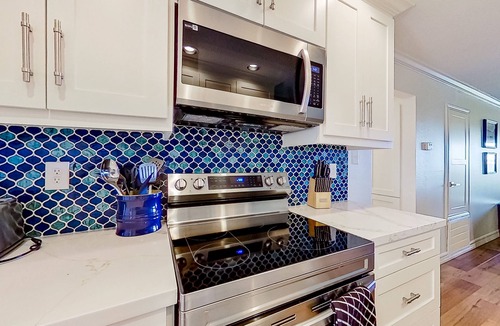 Walden on Lake Conroe Condo | Lakefront dog-friendly condo with lake views, pool, BBQ area, balcony, elevators