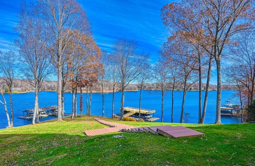 North Shore House | Lakefront, dog-friendly townhome with dock, boat slip, sunrise views & decks