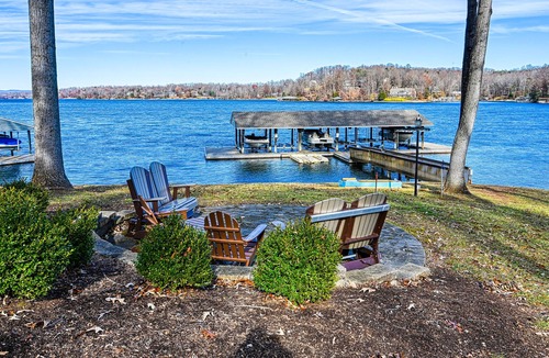North Shore House | Lakefront, dog-friendly townhome with dock, boat slip, sunrise views & decks