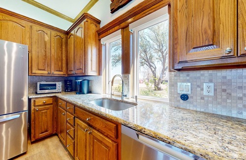 Bridgeport House | Lakefront estate with spectacular views, large deck, tiki bar, & private dock