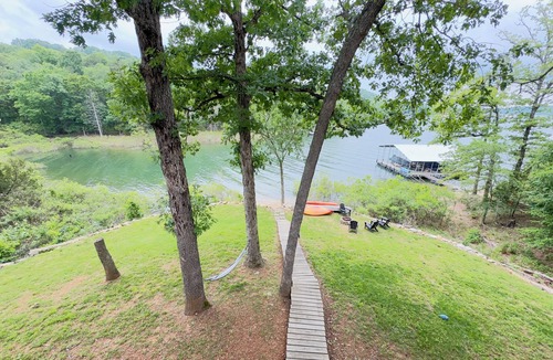 Rogers Cottage | Lakefront family friendly Chalet with fire pit and use of kayaks and canoe.