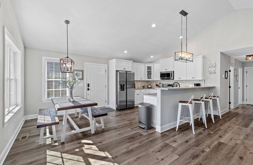 Southmont House | Lakefront Getaway: Dock, Kayaks, Fire Pit, 70" TV