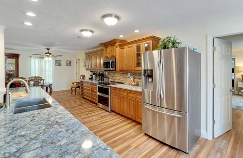 Seffner Community Alliance House | Lakefront Getaway - Luxurious Home - Pool & Games