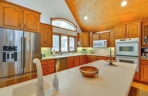 Gladwin House | Lakefront Gladwin Home w/Private Beach & Hot Tub