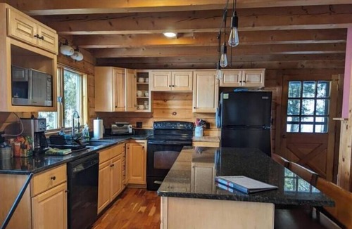 Saranac Lake Cabin | Lakefront Home and Boathouse on Lake Clear