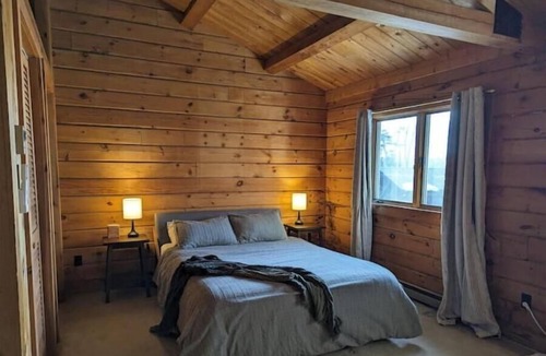 Saranac Lake Cabin | Lakefront Home and Boathouse on Lake Clear