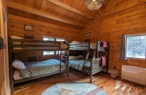 Saranac Lake Cabin | Lakefront Home and Boathouse on Lake Clear
