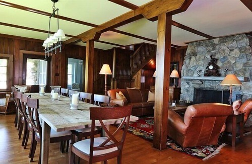 New Preston House | Lakefront Home set on five acres of land, deck, patio, lounge seating by...