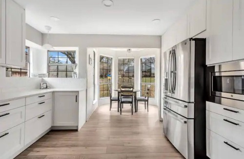 Rockwall House | Lakefront Home w/Game Room + outdoor oasis with firepit with a large king suite