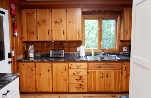 Town of Torrey House | Lakefront home w/Hot Tub, Kayaks, & Game Room