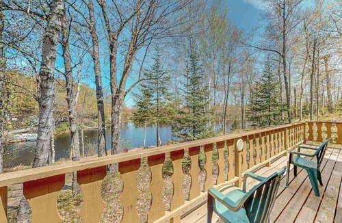 Presque Isle House | Lakefront home with large patio, fire pit, & a provided kayak