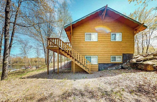 Presque Isle House | Lakefront home with large patio, fire pit, & a provided kayak