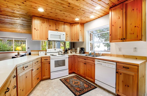 Grapeview House | Lakefront home with beach access, a firepit, washer/dryer & fireplace