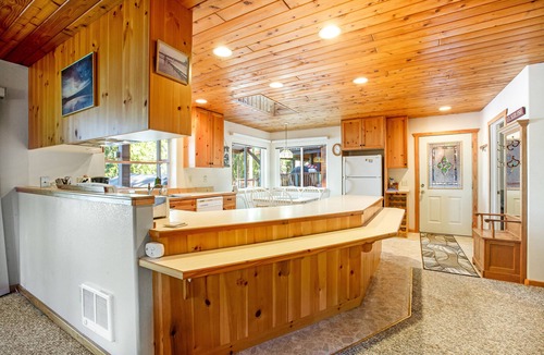 Grapeview House | Lakefront home with beach access, a firepit, washer/dryer & fireplace